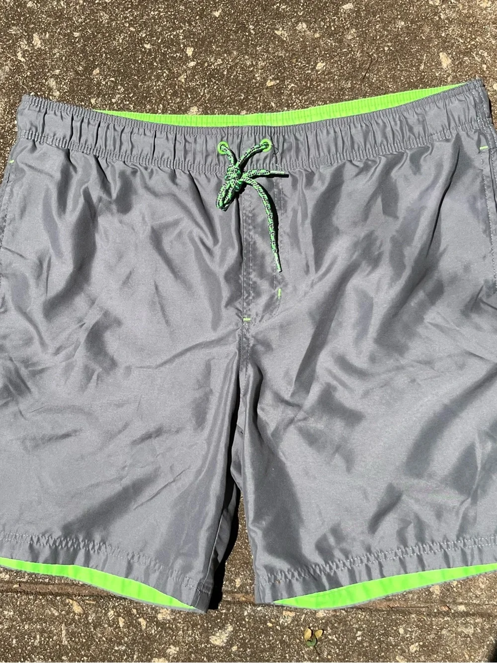 1 Gray Swim Trunks  M  with Neon Green Trim  1 Black Double-Buckle Slides 11/12